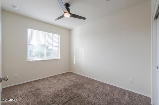 1127 E Tyler Ln, Casa Grande, AZ 85122 - carpeted spare room featuring baseboards and a ceiling fan