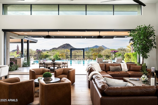 8328 E Whisper Rock Trl, Scottsdale, AZ 85266 - interior space with a mountain view, an outdoor hangout area, outdoor dining area, and a community pool