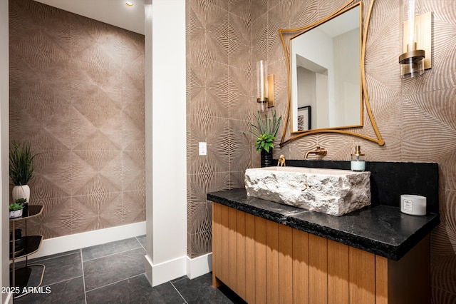 8328 E Whisper Rock Trl, Scottsdale, AZ 85266 - bathroom with baseboards, wallpapered walls, and vanity