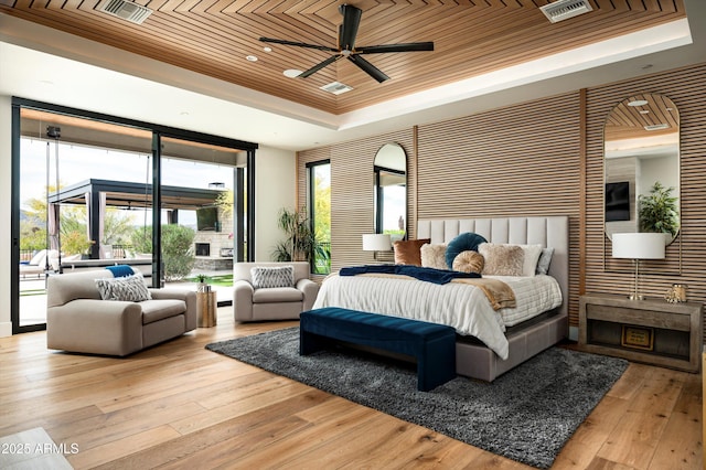 8328 E Whisper Rock Trl, Scottsdale, AZ 85266 - bedroom with a raised ceiling, visible vents, access to outside, and wooden ceiling