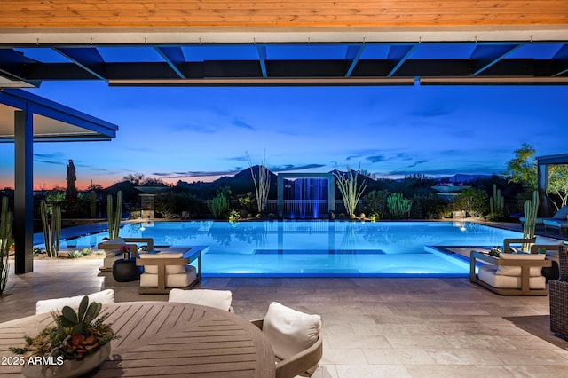 8328 E Whisper Rock Trl, Scottsdale, AZ 85266 - view of pool with an infinity pool and a patio