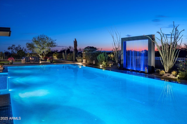 8328 E Whisper Rock Trl, Scottsdale, AZ 85266 - view of pool featuring fence and an infinity pool