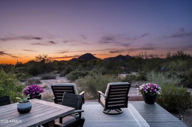8328 E Whisper Rock Trl, Scottsdale, AZ 85266 - deck at dusk featuring outdoor dining area