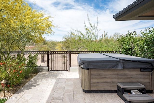 8328 E Whisper Rock Trl, Scottsdale, AZ 85266 - view of patio featuring fence and a hot tub