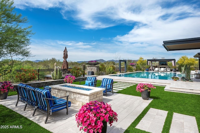 8328 E Whisper Rock Trl, Scottsdale, AZ 85266 - outdoor pool with a deck with mountain view, a fire pit, fence, a patio, and a lawn
