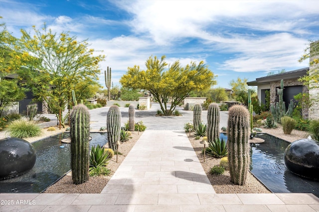 8328 E Whisper Rock Trl, Scottsdale, AZ 85266 - view of home's community featuring a garden pond