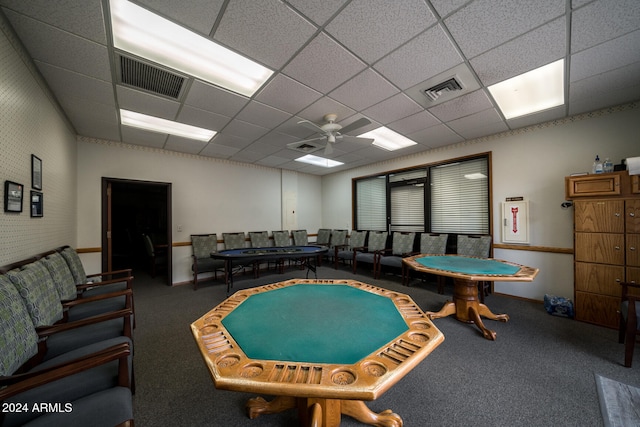 interior space with ceiling fan