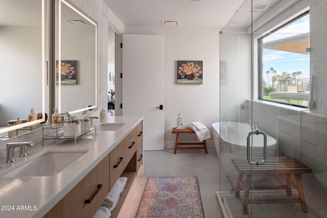 bathroom featuring separate shower and tub and vanity