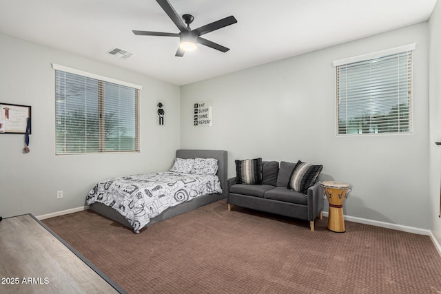 carpeted bedroom with ceiling fan