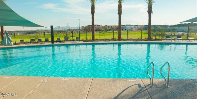 1205 W Sparrow Dr, Queen Creek, AZ 85140 - community pool with fence and a mountain view