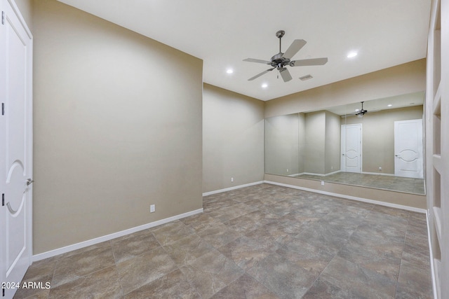 spare room featuring ceiling fan