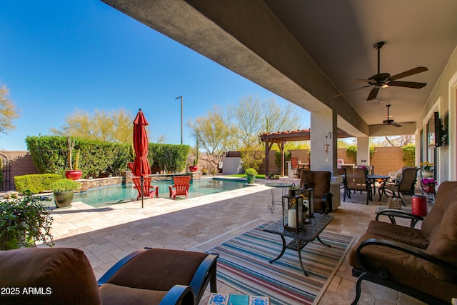 view of patio featuring a fenced backyard, a fenced in pool, ceiling fan, and outdoor dining area