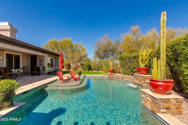 pool featuring a patio area