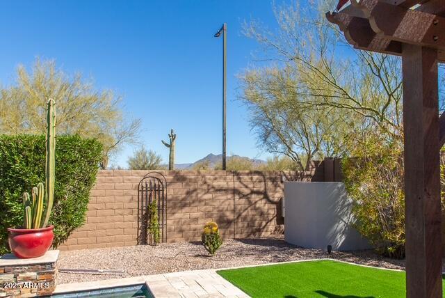 view of yard featuring fence
