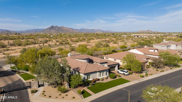 birds eye view of property featuring a residential view and a mountain view