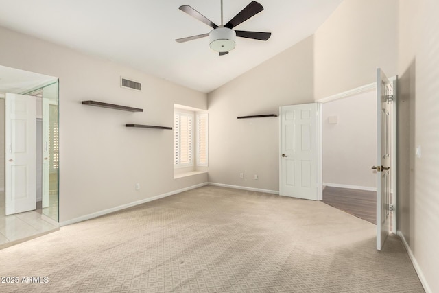 unfurnished bedroom with high vaulted ceiling, carpet, a ceiling fan, baseboards, and visible vents