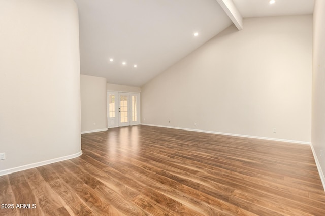 empty room featuring french doors, beam ceiling, wood finished floors, baseboards, and recessed lighting
