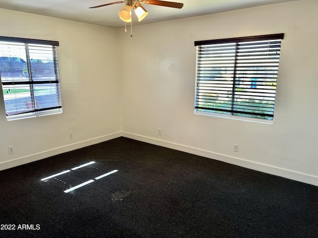 4213 N Westview Dr, Phoenix, AZ 85015 - empty room with ceiling fan, baseboards, and dark carpet