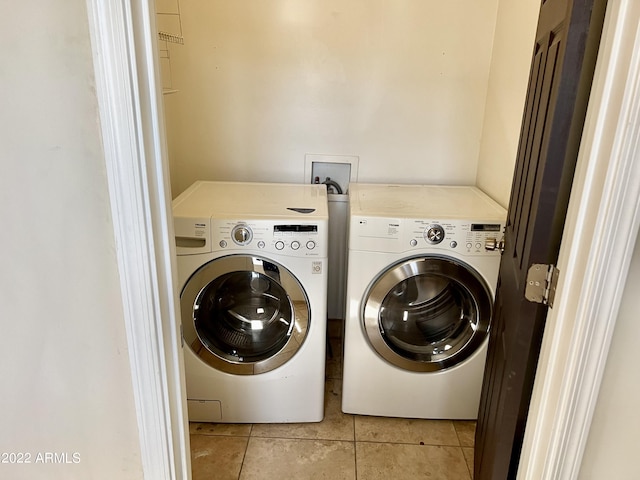 4213 N Westview Dr, Phoenix, AZ 85015 - washroom with independent washer and dryer and light tile patterned floors