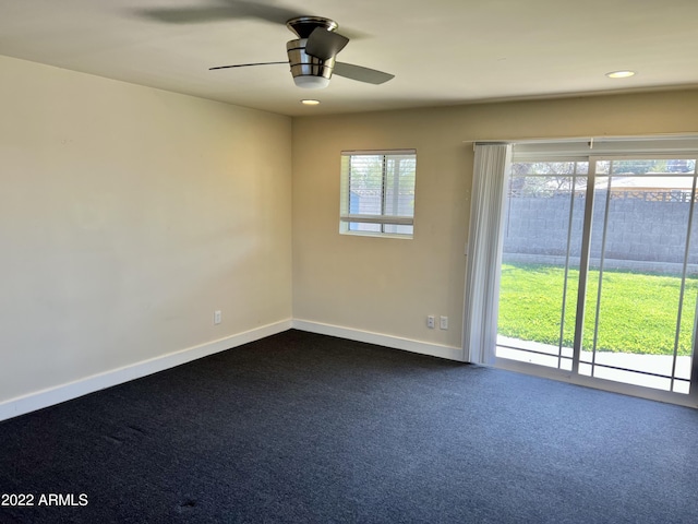 4213 N Westview Dr, Phoenix, AZ 85015 - unfurnished room featuring dark colored carpet, baseboards, ceiling fan, and recessed lighting