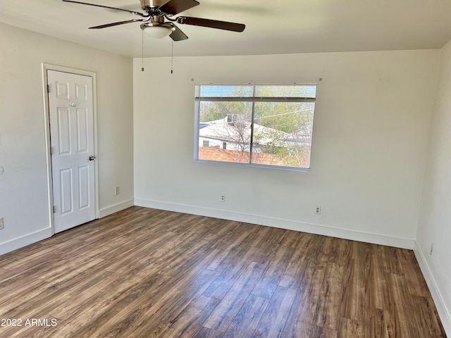 4213 N Westview Dr, Phoenix, AZ 85015 - empty room with wood finished floors, ceiling fan, and baseboards