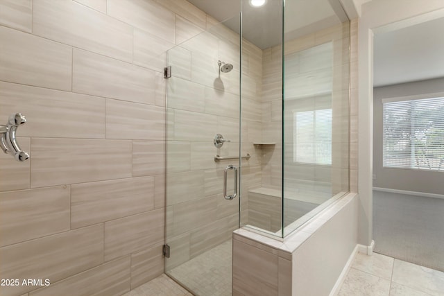 16953 W Merrell St, Goodyear, AZ 85395 - bathroom with baseboards, a stall shower, tile patterned floors, and recessed lighting