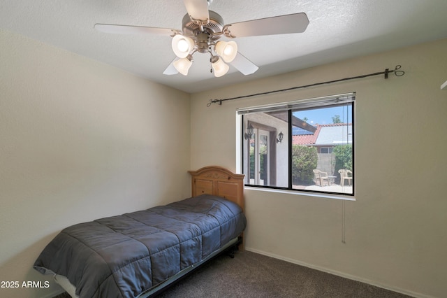 bedroom with carpet and a ceiling fan
