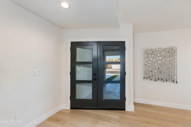 14012 N 57th Pl, Scottsdale, AZ 85254 - doorway to outside with wood finished floors, french doors, and recessed lighting