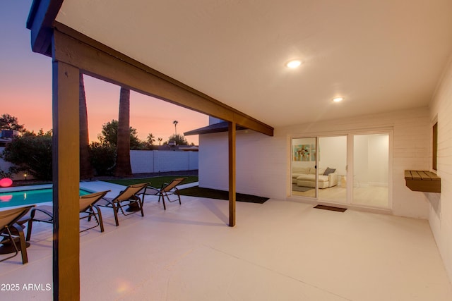 14012 N 57th Pl, Scottsdale, AZ 85254 - patio terrace at dusk featuring a fenced backyard and a patio
