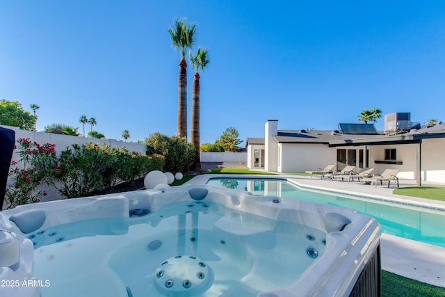 14012 N 57th Pl, Scottsdale, AZ 85254 - view of pool featuring a hot tub, a fenced backyard, and a patio area