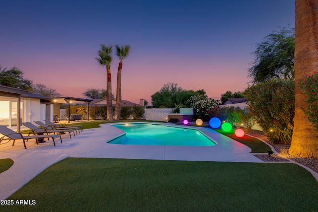 14012 N 57th Pl, Scottsdale, AZ 85254 - pool at dusk featuring a fenced backyard and a patio area