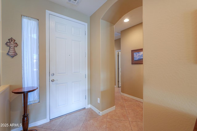 entrance foyer with light tile patterned floors