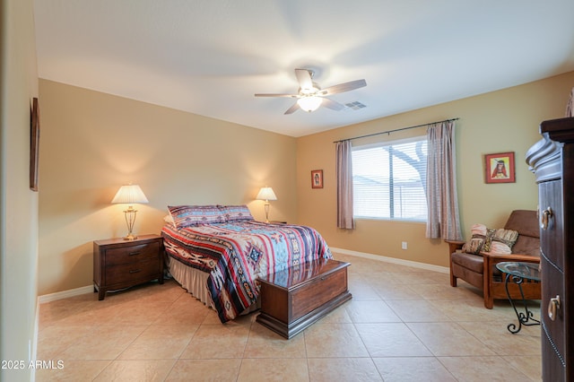 bedroom featuring light tile patterned floors and ceiling fan