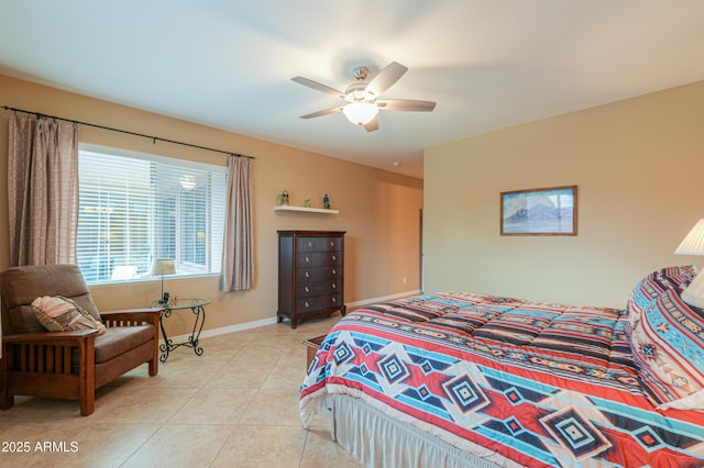 tiled bedroom with ceiling fan