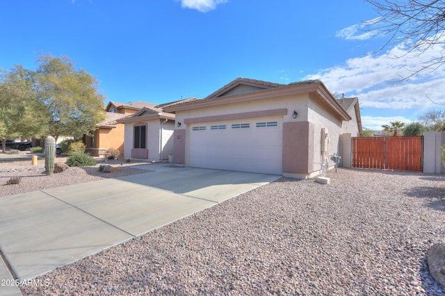 ranch-style home featuring a garage