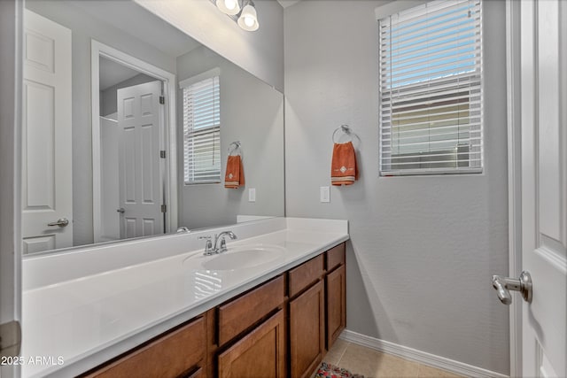 bathroom with vanity and tile patterned floors