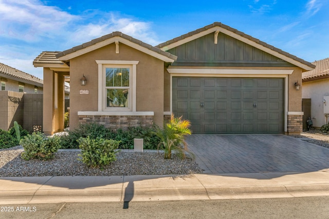 view of front of home with a garage