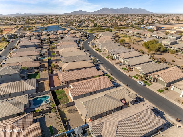 drone / aerial view featuring a mountain view