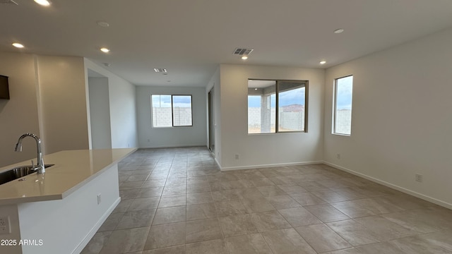 spare room featuring sink