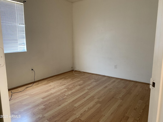 empty room featuring light wood finished floors