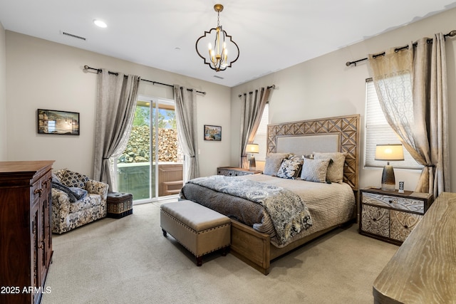 1417 Eureka Ridge Way, Prescott, AZ 86303 - bedroom featuring access to exterior, a chandelier, and light carpet