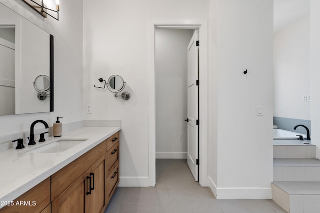 1417 Eureka Ridge Way, Prescott, AZ 86303 - bathroom with vanity, baseboards, tile patterned flooring, and a bath