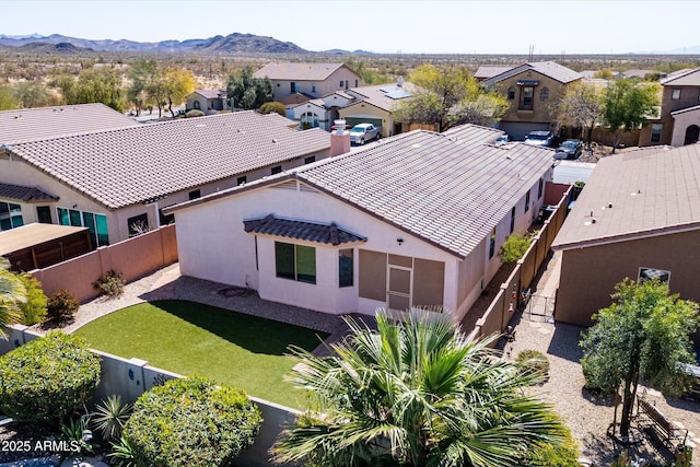 aerial view with a mountain view and a residential view