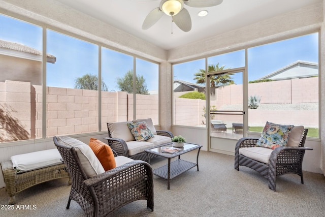 sunroom / solarium with ceiling fan