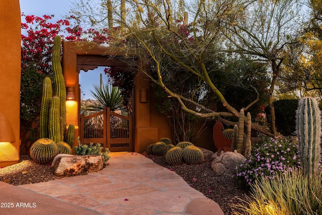 exterior space with a gate