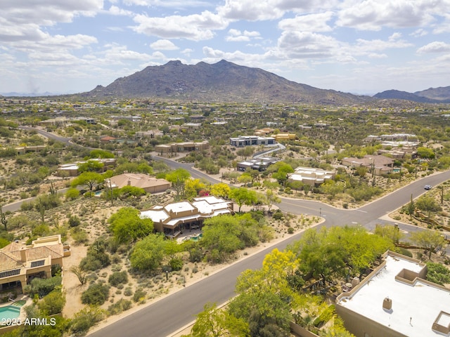 birds eye view of property with a mountain view and a residential view