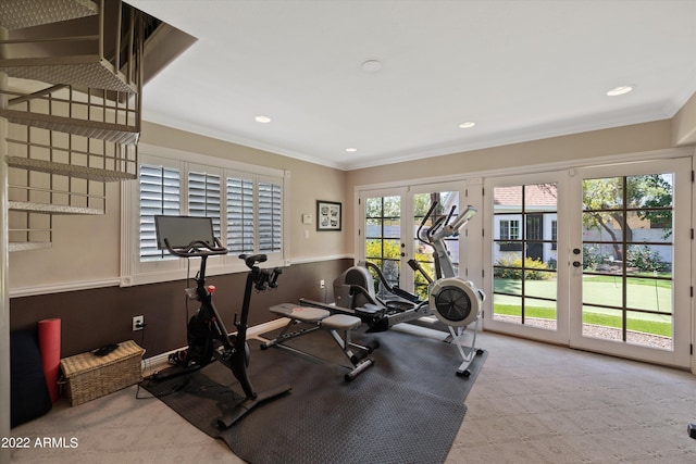 workout room featuring french doors, light colored carpet, and ornamental molding