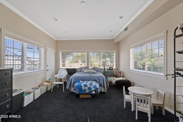 bedroom featuring crown molding and carpet flooring