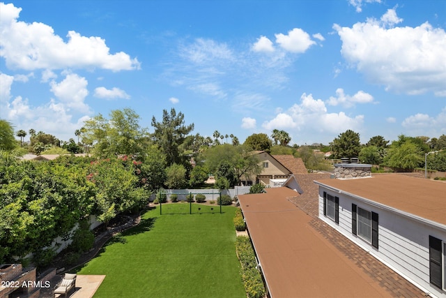 view of home's community with a lawn