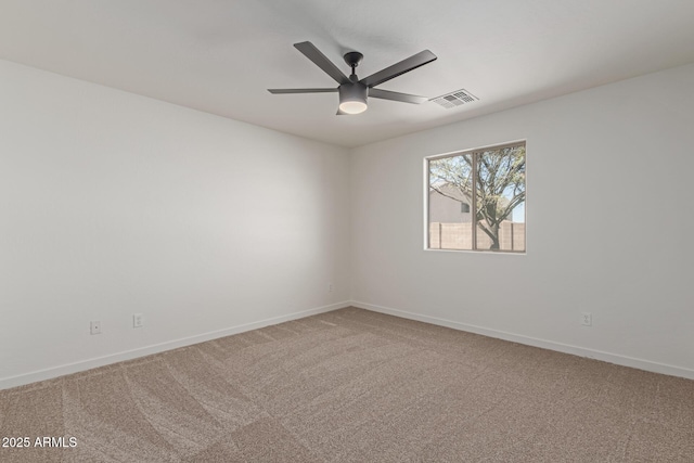 unfurnished room with carpet floors and ceiling fan